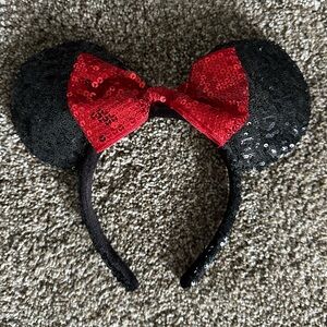 Authentic sequent, Minnie Mouse ears. Purchased in Disney World theme park.